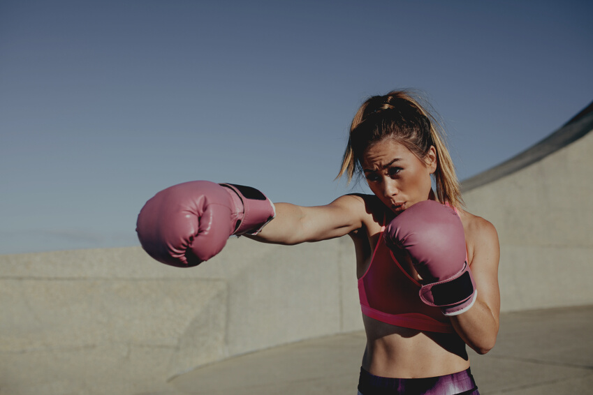 Sportswoman Training Boxing Outdoors